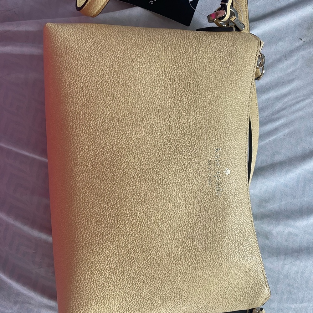 Kate Spade Cream Crossbody Bag with Sleek Design